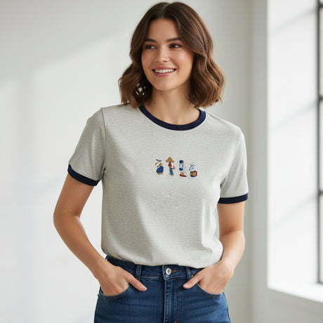 White t-shirt with colorful graphic on a dark surface