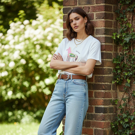 White t-shirt with a graphic design on a gray surface