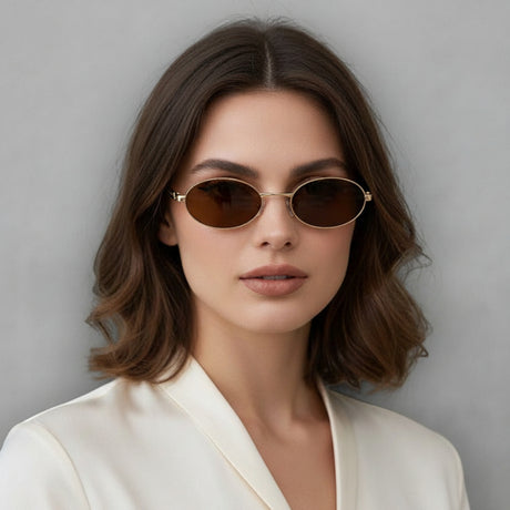 Woman wearing sunglasses with a plain background and 'Sunglass 9s' branding.