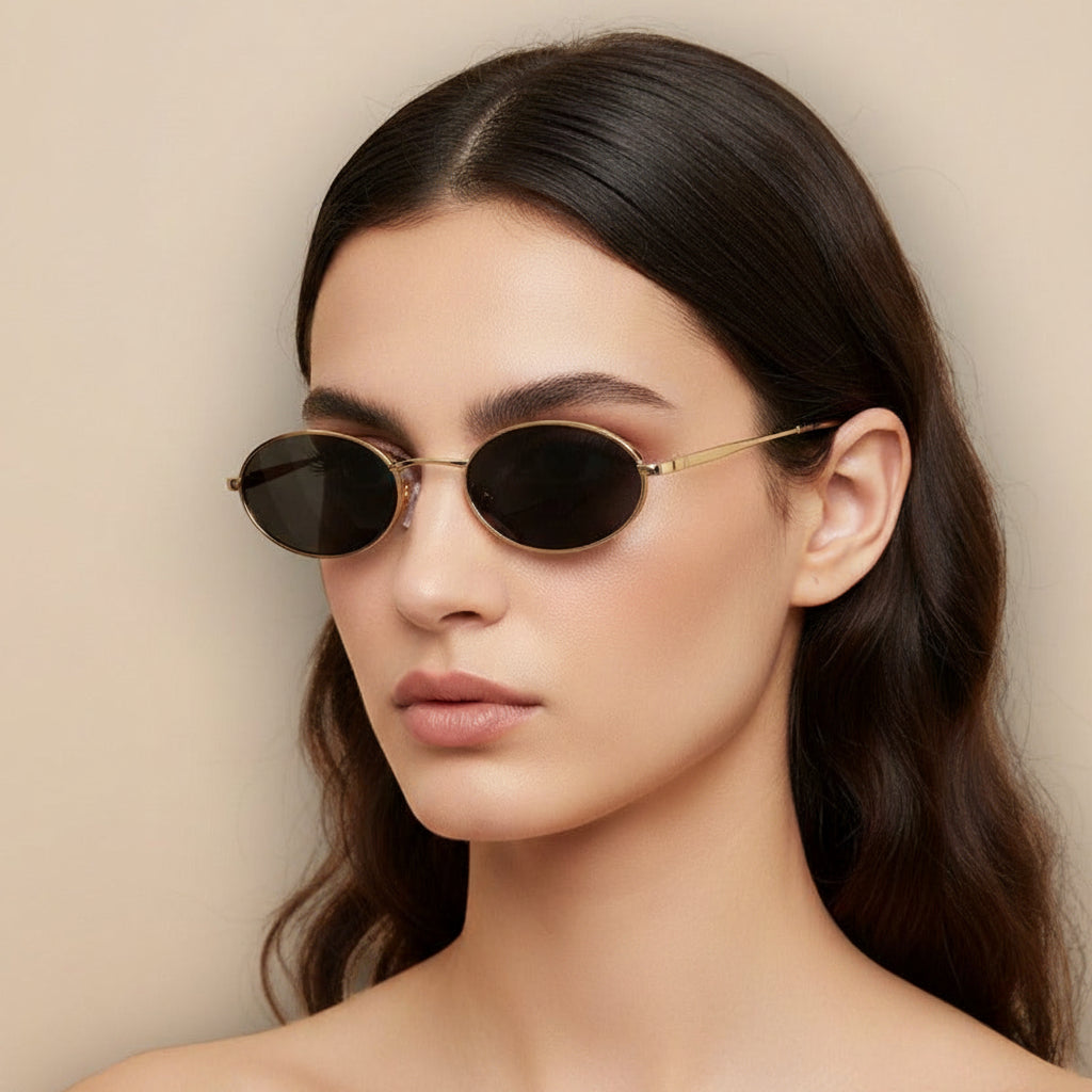 Woman wearing round sunglasses with a beige background