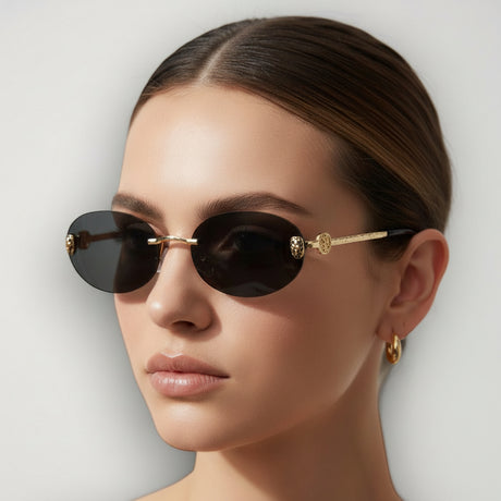 Sunglasses being worn by a model with a neutral background