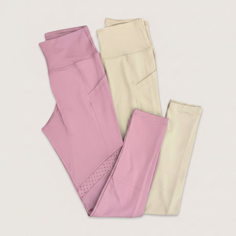 Two pairs of leggings, one pink and one beige, on a light gray background.