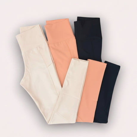 Three pairs of leggings in beige, peach, and black with a price tag and 'Jack Gifts' branding.