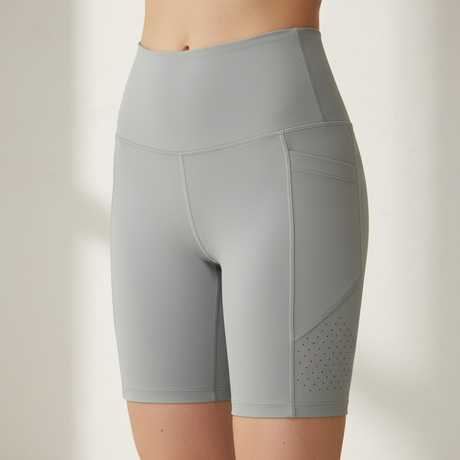 Gray athletic shorts on a plain background