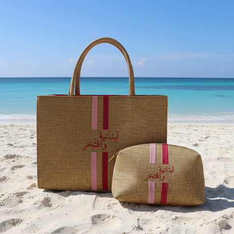 Two woven bags with pink stripes on a wooden surface
