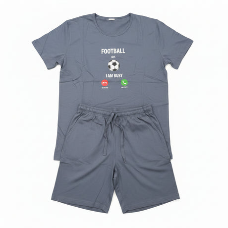 Gray t-shirt and shorts set with graphics on a tiled floor