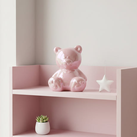 Pink bear-shaped bottle on a counter with a store setting in the background