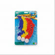 Colorful toy flying snake in packaging on a white surface