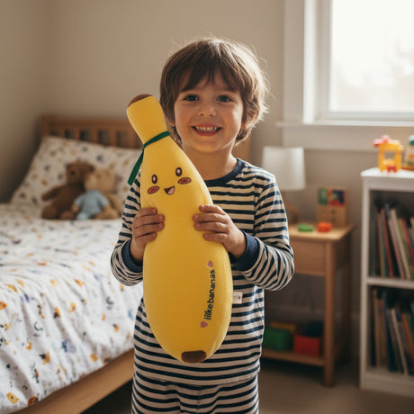 Yellow plush toy resembling a banana on a dark floor with legs visible.