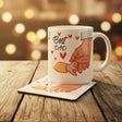 Mug and coaster set with 'Best Dad' design in a store setting