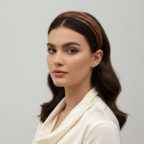 woman wearing brown headband