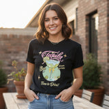 Black hoodie with tequila-themed graphic design on a rack.