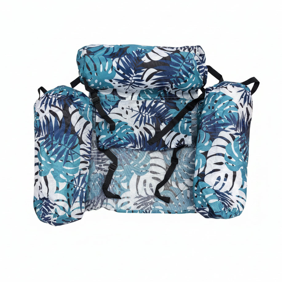 Set of blue and white patterned bags on a light gray background