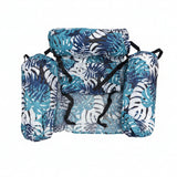 Set of blue and white patterned bags on a light gray background