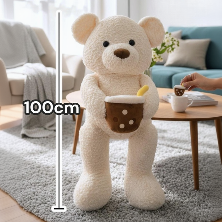 Cream boucle teddy bear standing upright with a brown boba cup plush tucked against its chest, shown at 100cm