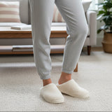 Standing view of ivory nubby mules on a thick stepped cushioned midsole