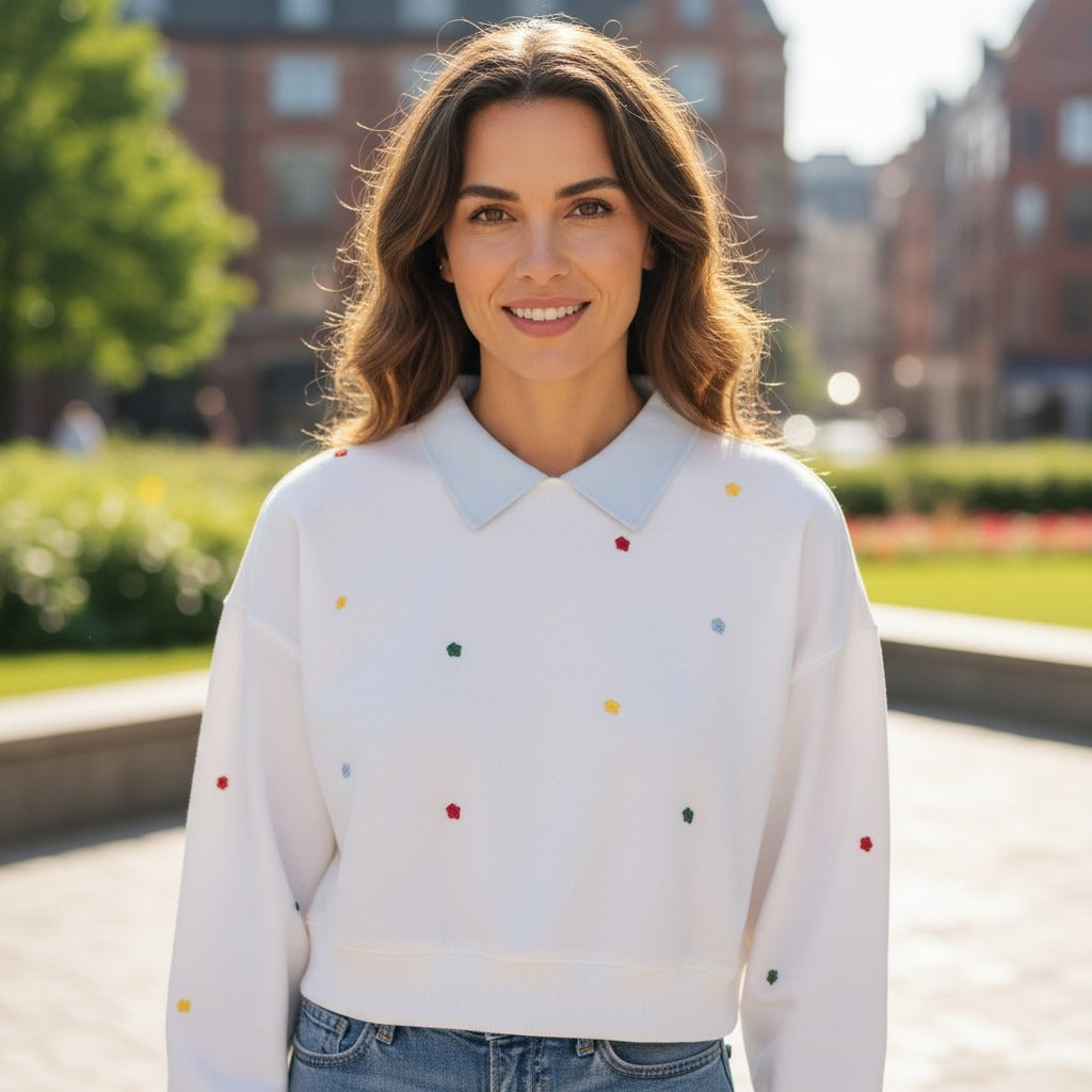 Woman in white collared sweatshirt with tiny embroidered flowers, Jack Gifts Online Lebanon