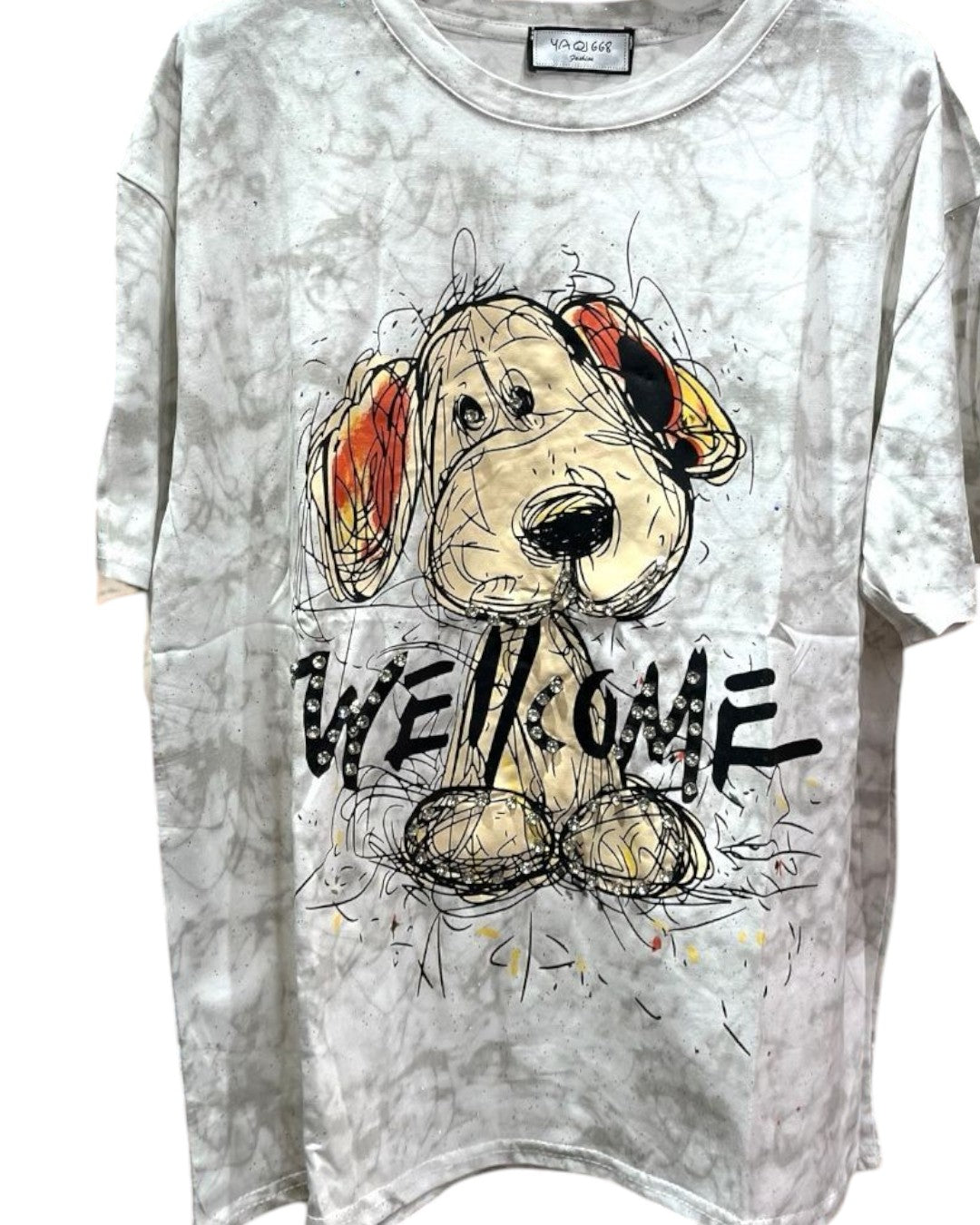 Oversized white tshirt with a graphic of a dog and the text 'WELCOME' below it