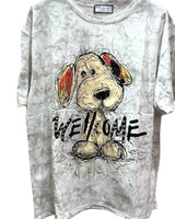 Oversized white tshirt with a graphic of a dog and the text 'WELCOME' below it
