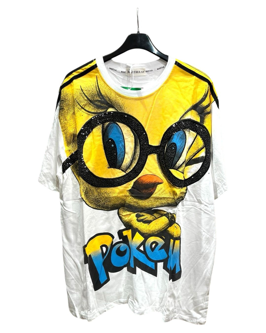 An oversized white tshirt featuring a printed character resembling Tweety with large glasses and a yellow color scheme