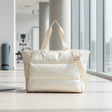 Quilted white puffer tote bag with top handles, roomy everyday bag