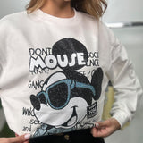 Close up of the white sweatshirt showing the sparkly rhinestone print and lettering