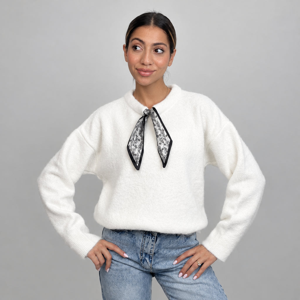 Ivory wool top with a skinny printed neck scarf, worn with light wash jeans