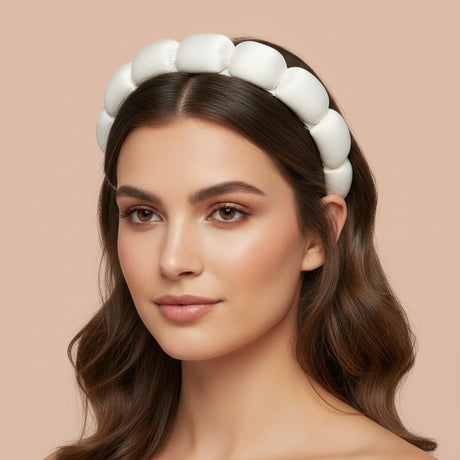 White puffy spa headband worn with long waves, ready for a skincare routine