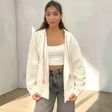 Oversized white zip hoodie jacket with pink braided drawstrings and tassel ends