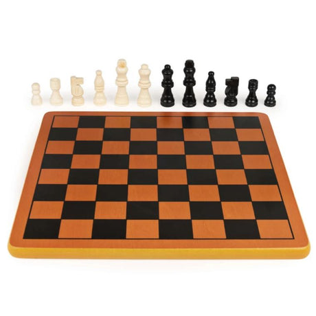 Empty wooden chess board with one of each cream and black piece lined up behind it