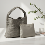 Grey woven texture shoulder bag in a casual styled setting