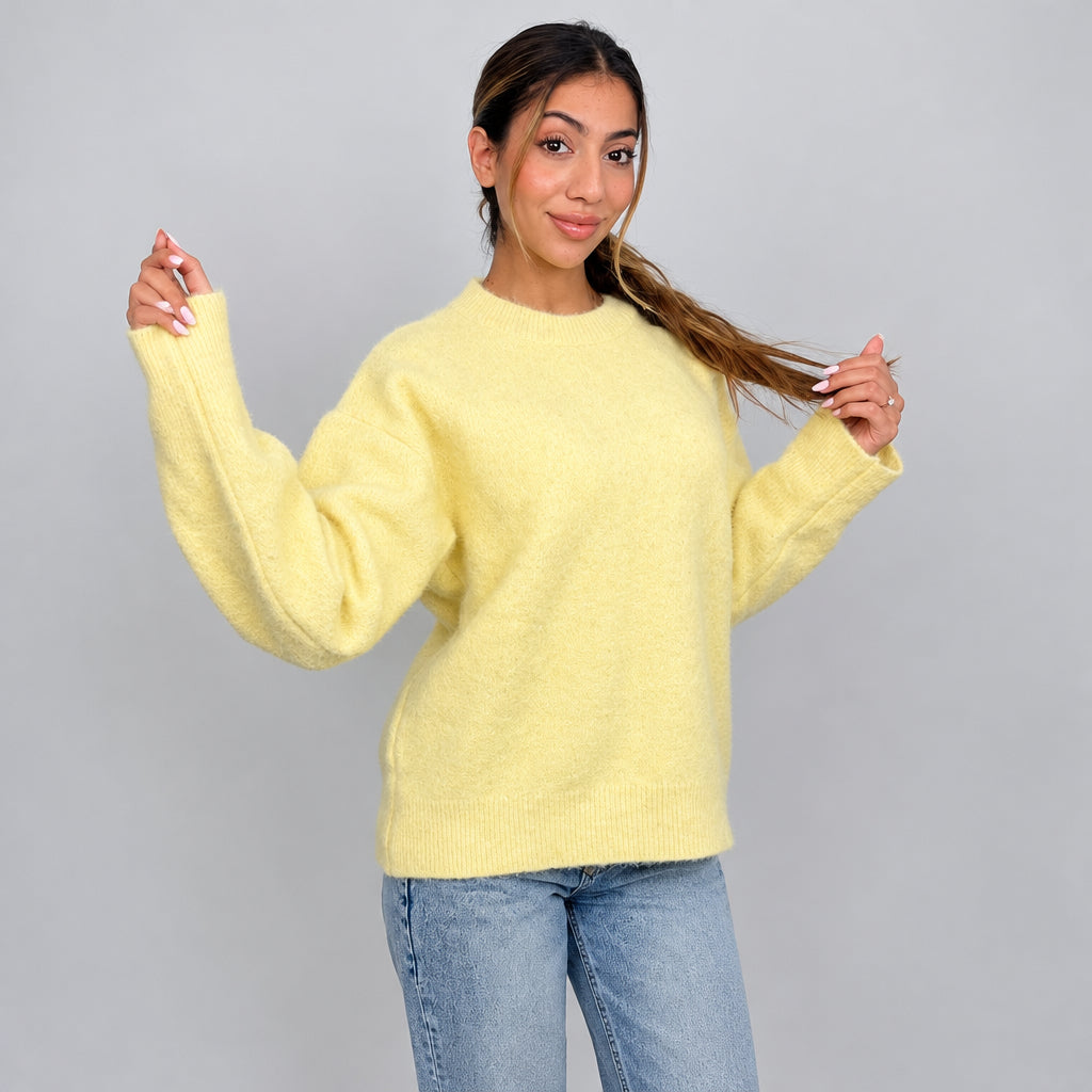 Butter yellow fuzzy crew neck sweater with long relaxed sleeves