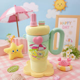 Colorful children's cup with handle and umbrella design on a pastel background