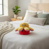 Yellow and red octopus plush with amazed and grumpy faces
