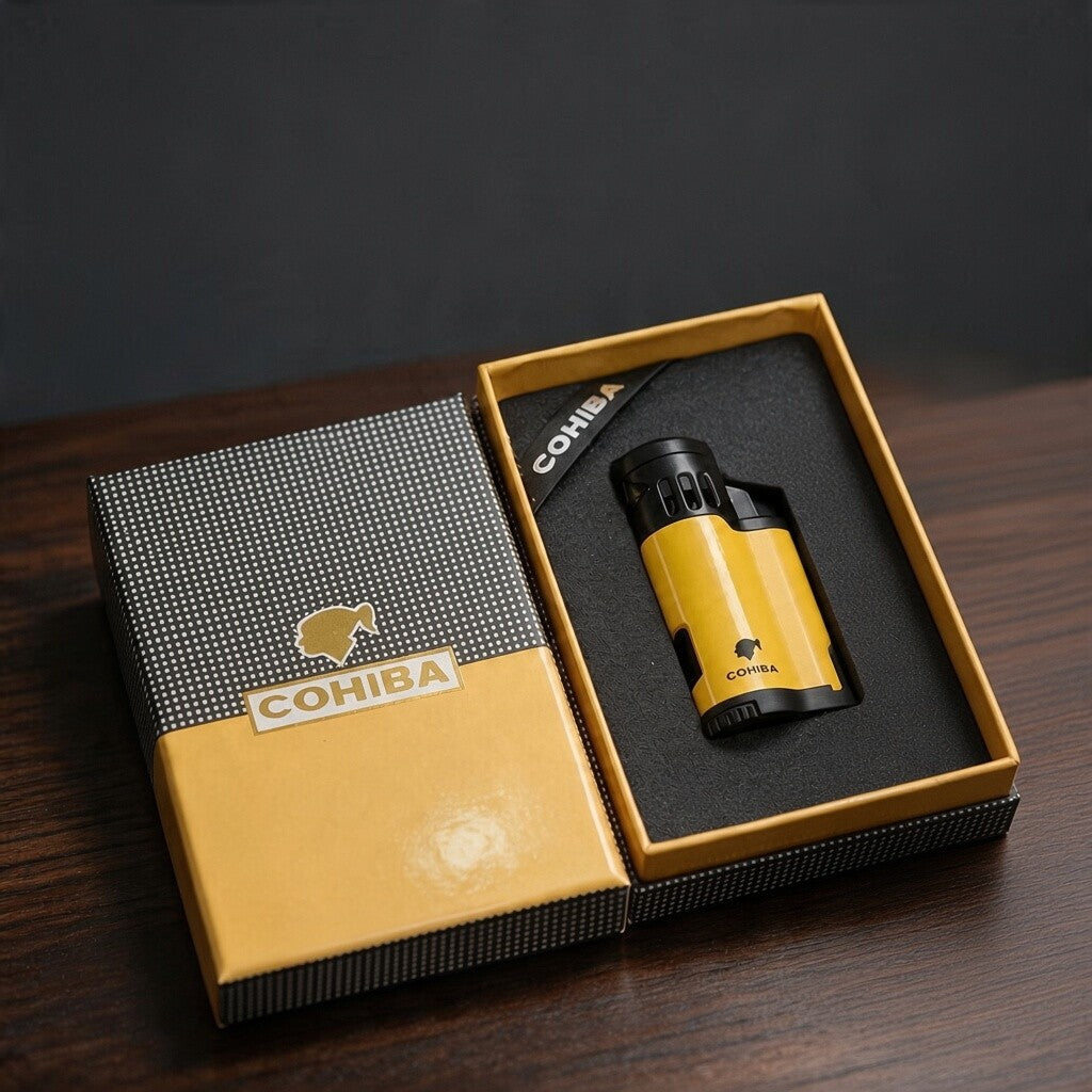 Yellow and black torch cigar lighter with a vented head in an open black and gold gift box