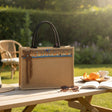 Handmade jute beach bag with beaded trim and crocheted brown starfish charm, Jack Gifts Lebanon