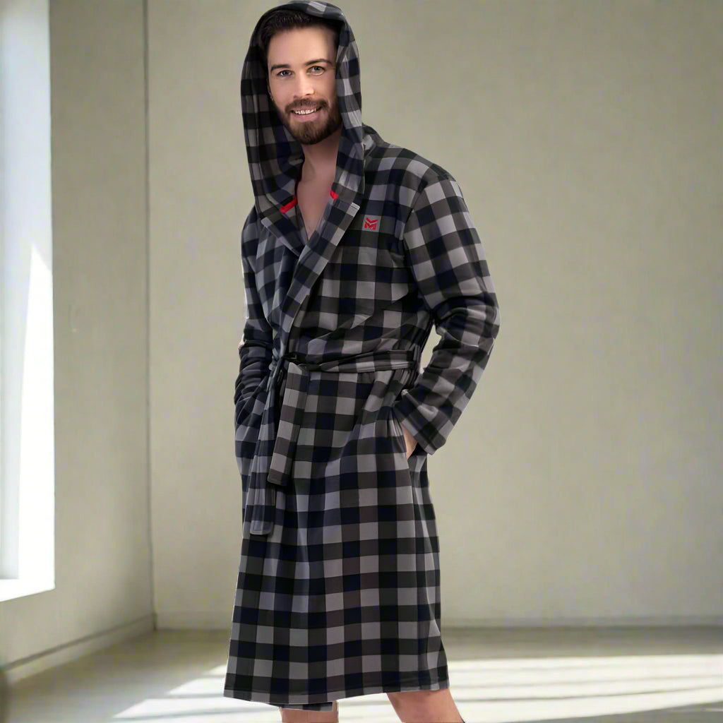 Man wearing a grey and black checkered hooded fleece robe