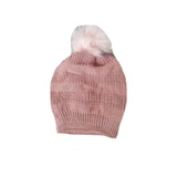 Pink beanie photographed on white, pale pom pom on top