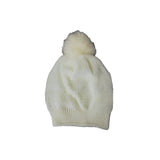 Cream white beanie on a plain background with a fluffy pom
