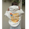 White "Don't Trip Over Whats Behind You" Hoodie